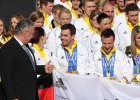 Bayerns Innen- und Sportminister Joachim Herrmann und Bundespräsident Joachim Gauck empfangen die Deutsche Olympiamannschaft nach den Olympischen Winterspielen 2014 in Sotschi am Flughafen München